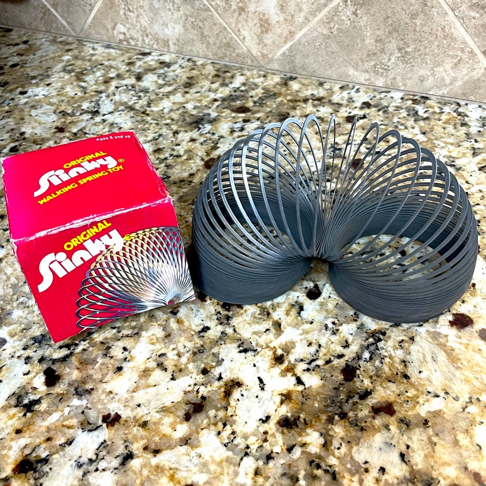 Vintage toy original slinky in box.